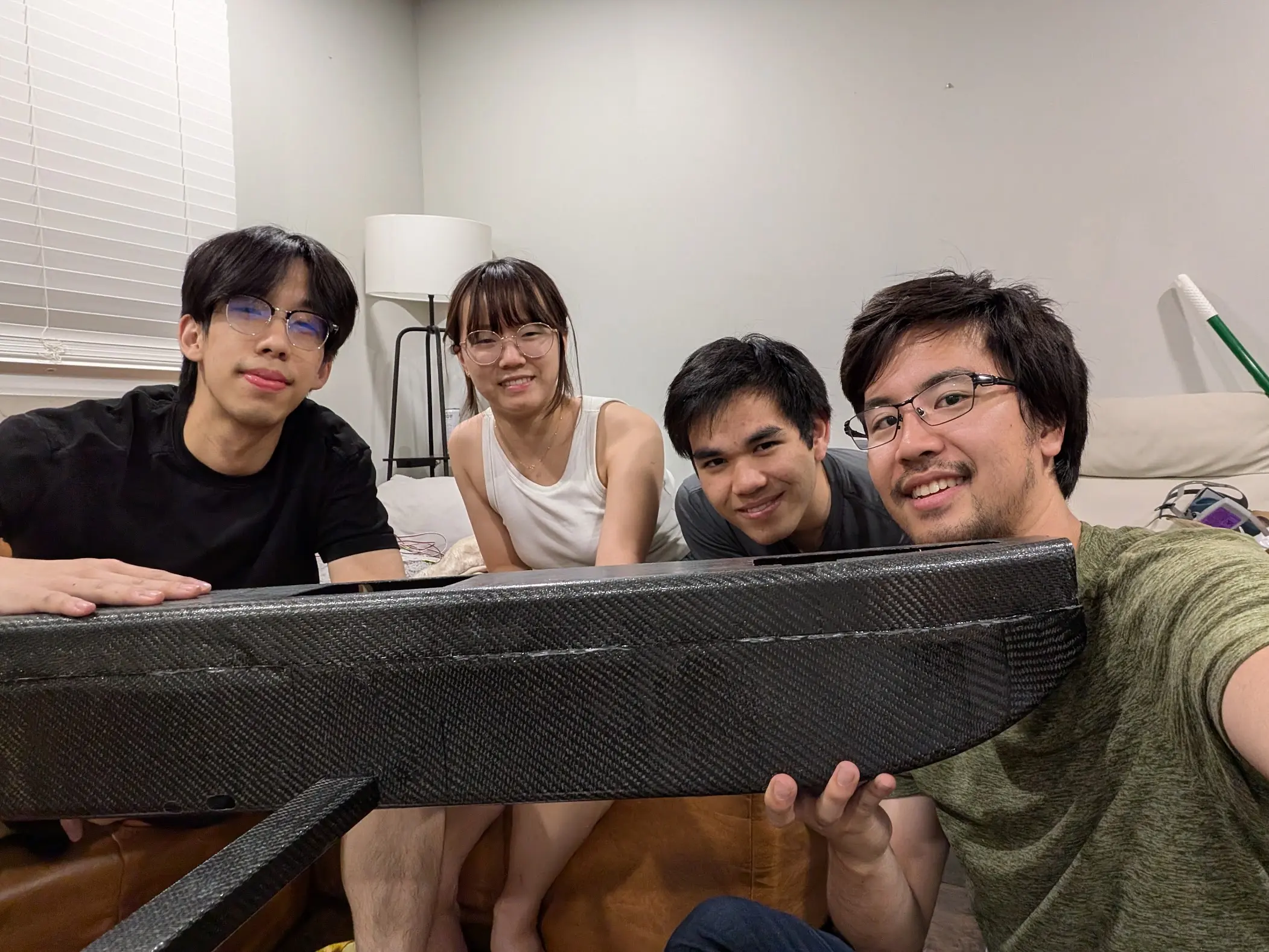 Team with the finished carbon fiber airframe